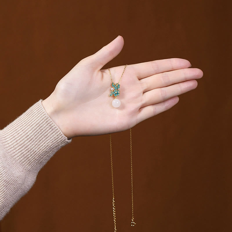 Collier, bague et boucles d'oreilles en jade blanc et argent avec perles de bénédiction