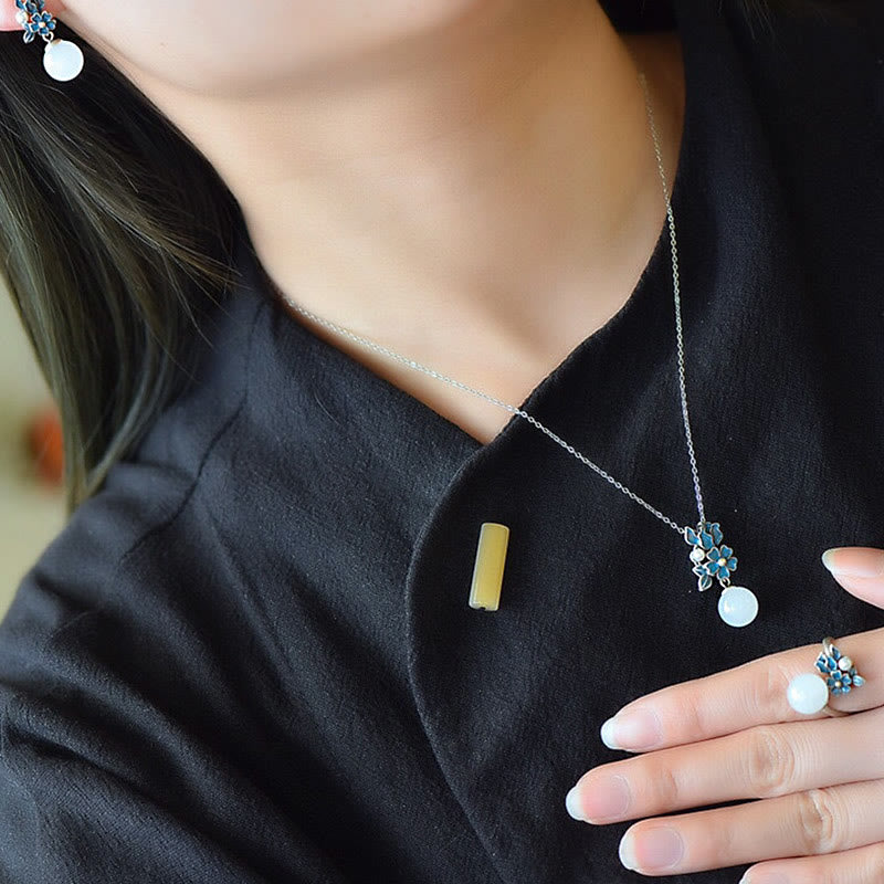 Collier, bague et boucles d'oreilles en jade blanc et argent avec perles de bénédiction