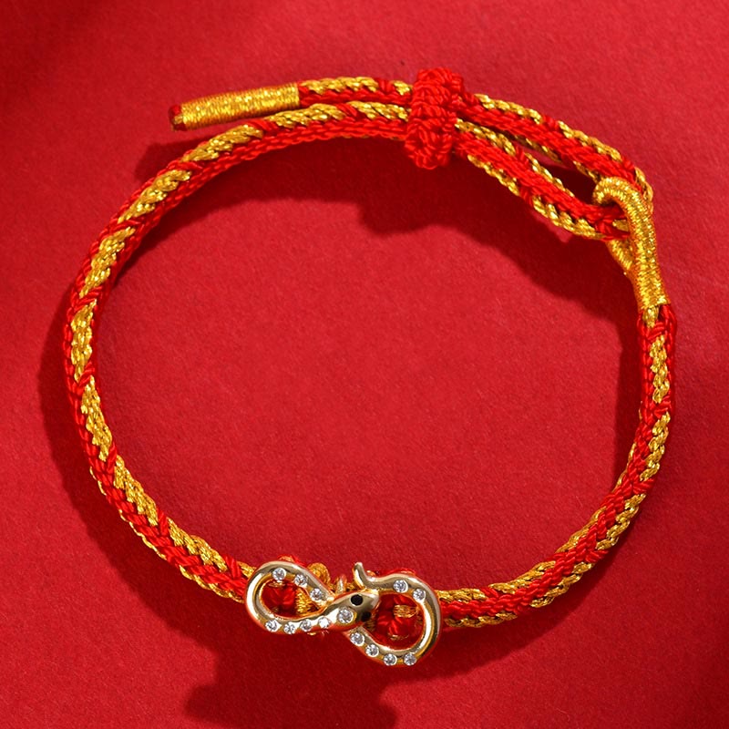 Bracelet tressé porte-bonheur en fil rouge Année du Serpent