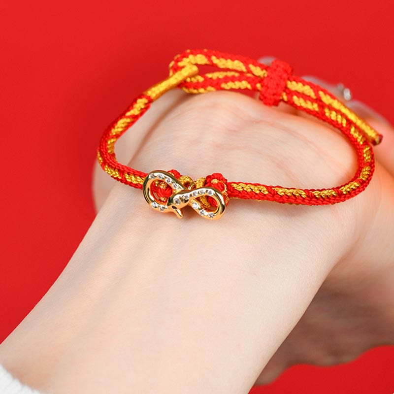 Bracelet tressé porte-bonheur en fil rouge Année du Serpent