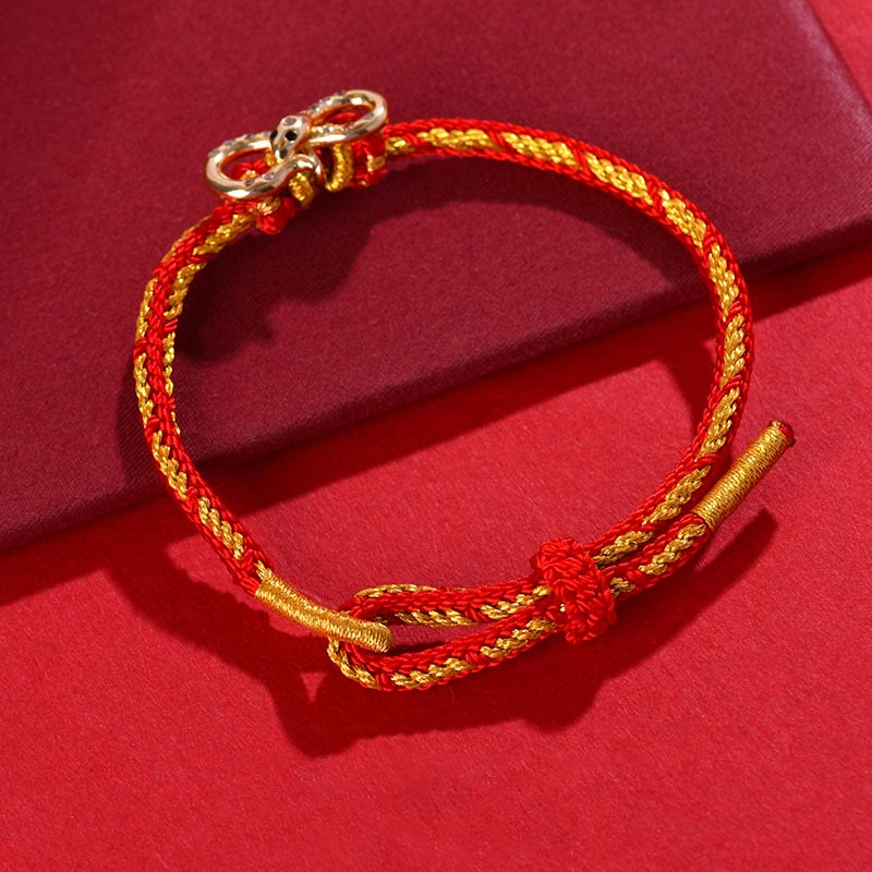 Bracelet tressé porte-bonheur en fil rouge Année du Serpent