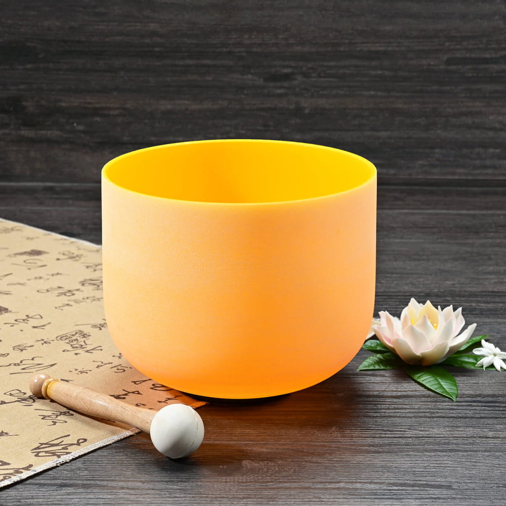 Orange crystal singing bowl with wooden mallet for Yellow Color E Note Solar Plexus Chakra