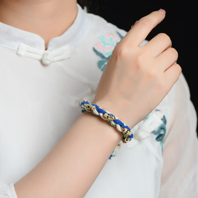 Bracelet en fil rouge Zakiram Wealth Goddess fabriqué à la main